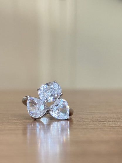 The Sistora Three-Stone Pear Ring