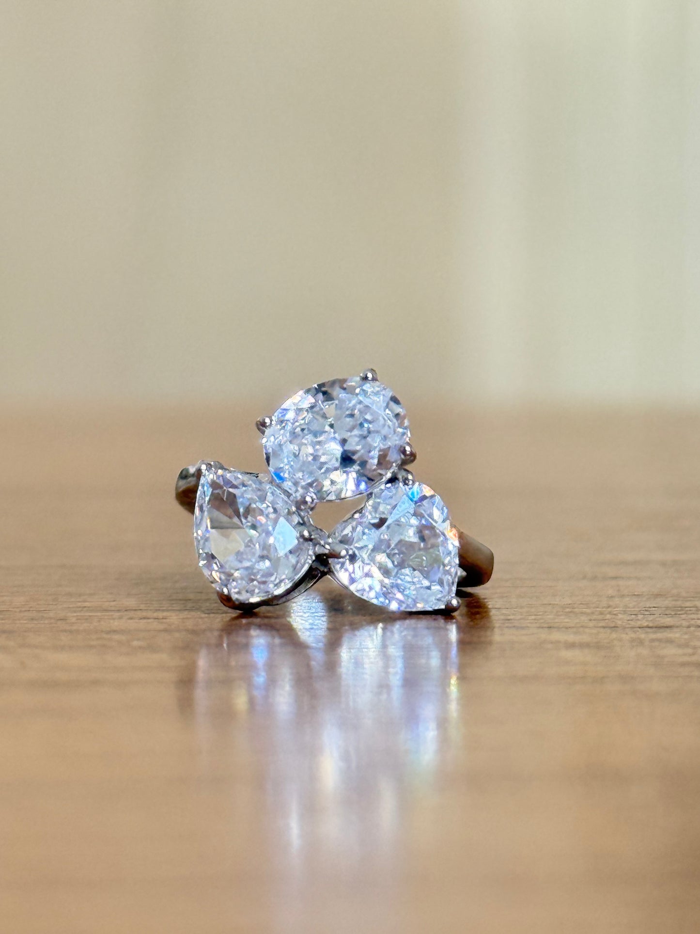 The Sistora Three-Stone Pear Ring