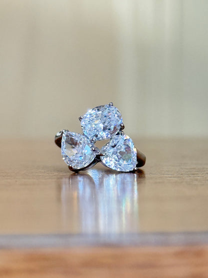 The Sistora Three-Stone Pear Ring