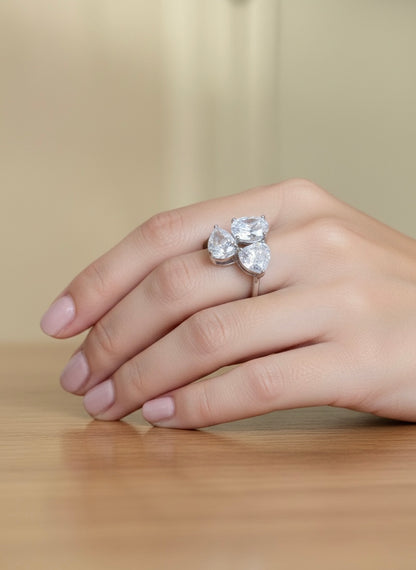 The Sistora Three-Stone Pear Ring