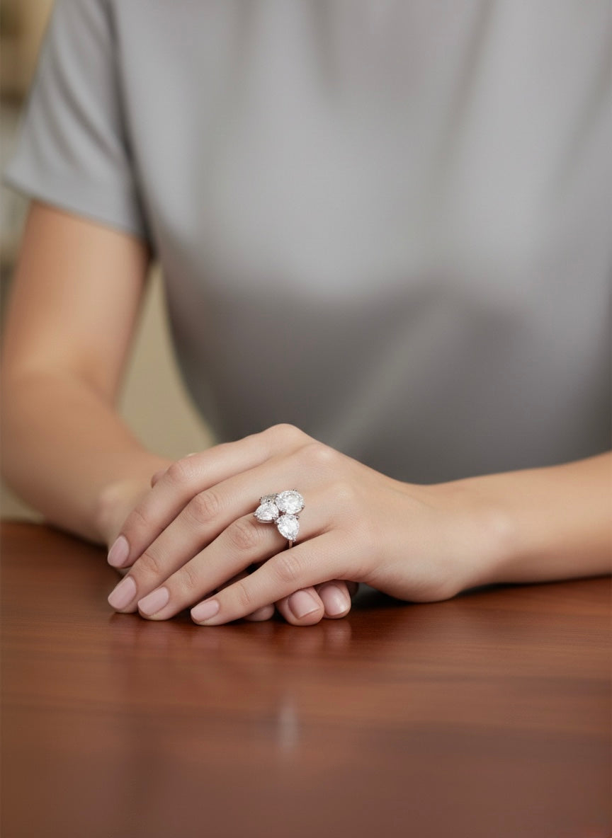 The Sistora Three-Stone Pear Ring
