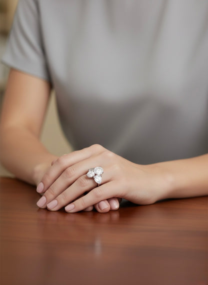 The Sistora Three-Stone Pear Ring