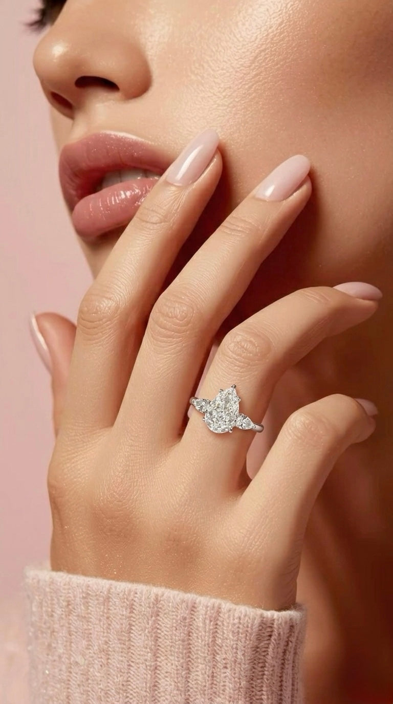The Sistora 'Stellar Tear' D-Color Three-Stone Pear Ring (925 Silver)