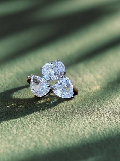 The Sistora Three-Stone Pear Ring