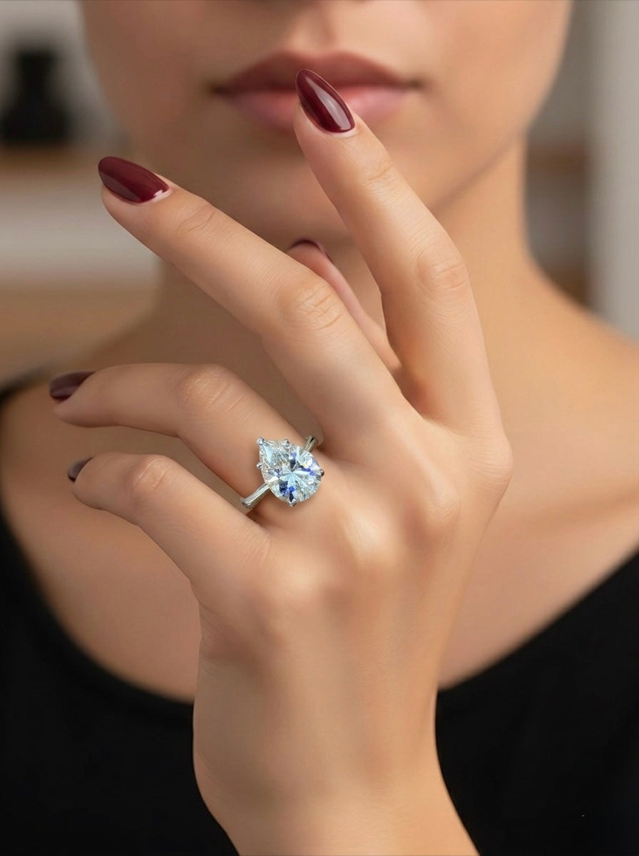 The Sistora 'Lunar Tear' Pear-Cut Moissanite Solitaire Ring (925 Silver)