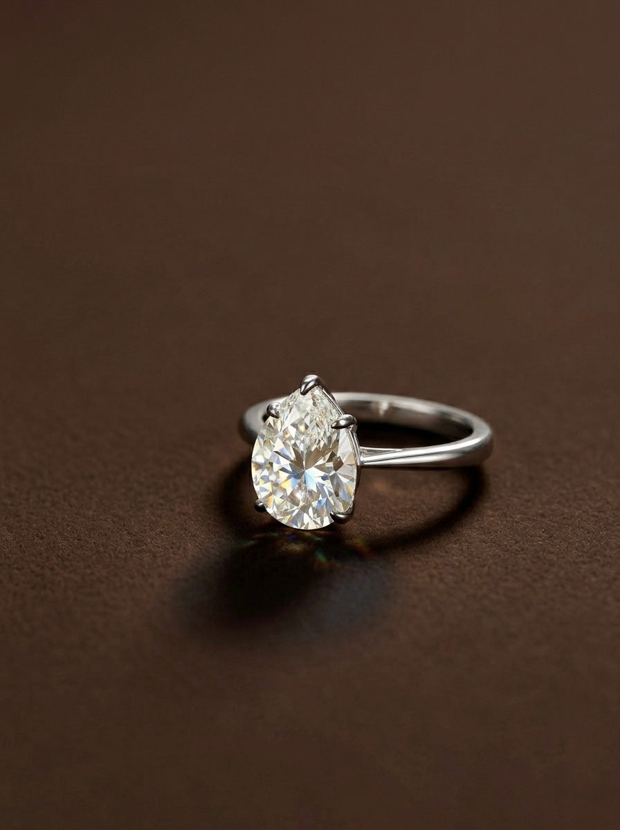 The Sistora 'Lunar Tear' Pear-Cut Moissanite Solitaire Ring (925 Silver)