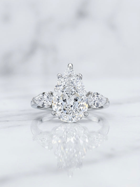 The Sistora 'Stellar Tear' D-Color Three-Stone Pear Ring (925 Silver)