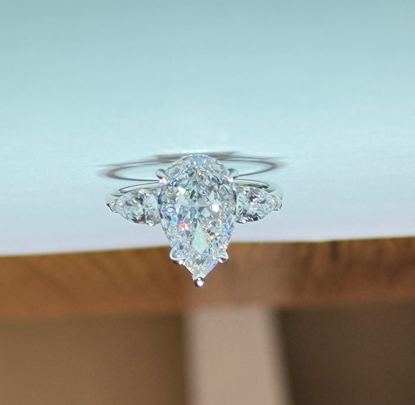 The Sistora 'Stellar Tear' D-Color Three-Stone Pear Ring (925 Silver)