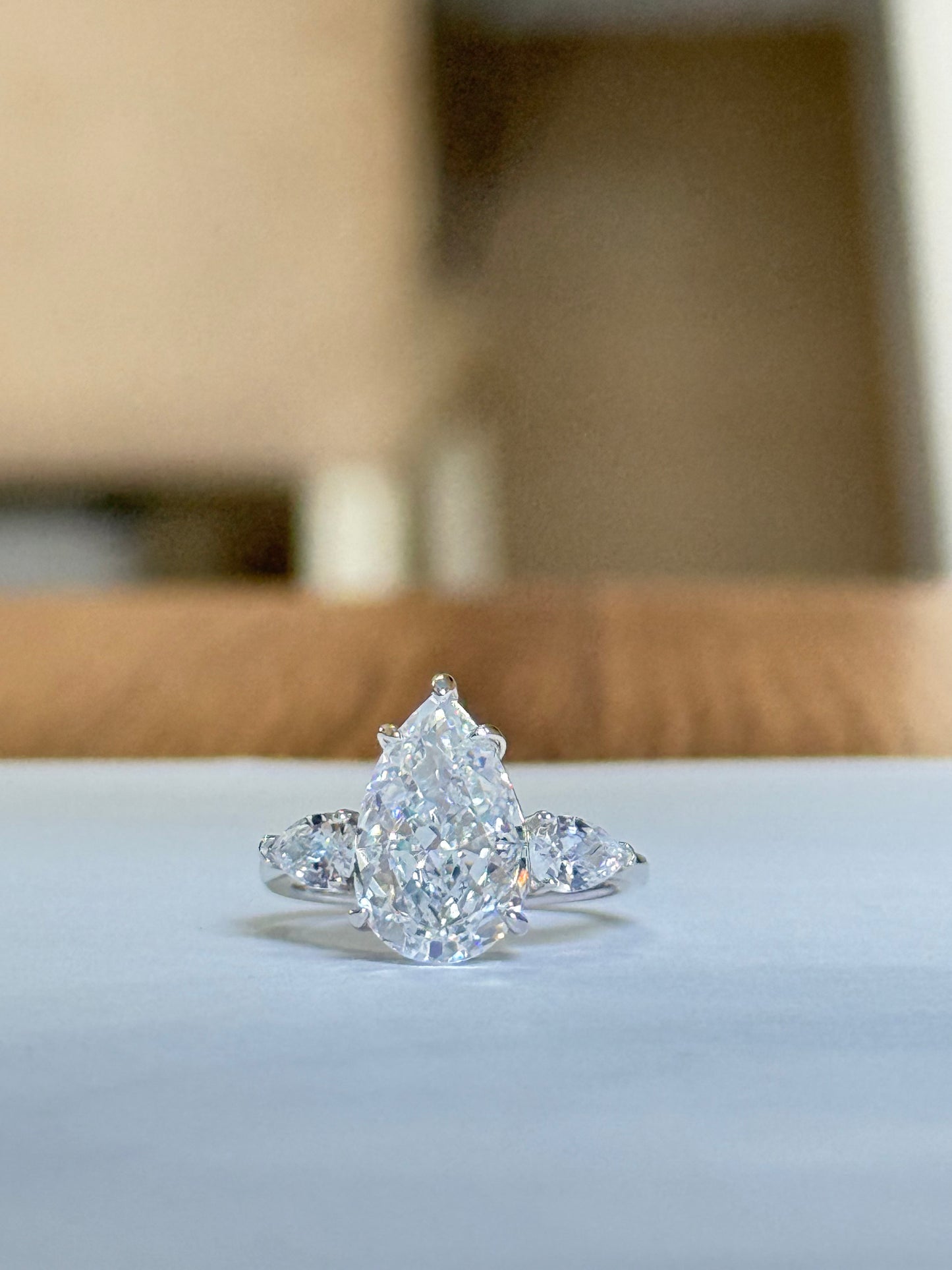 The Sistora 'Stellar Tear' D-Color Three-Stone Pear Ring (925 Silver)