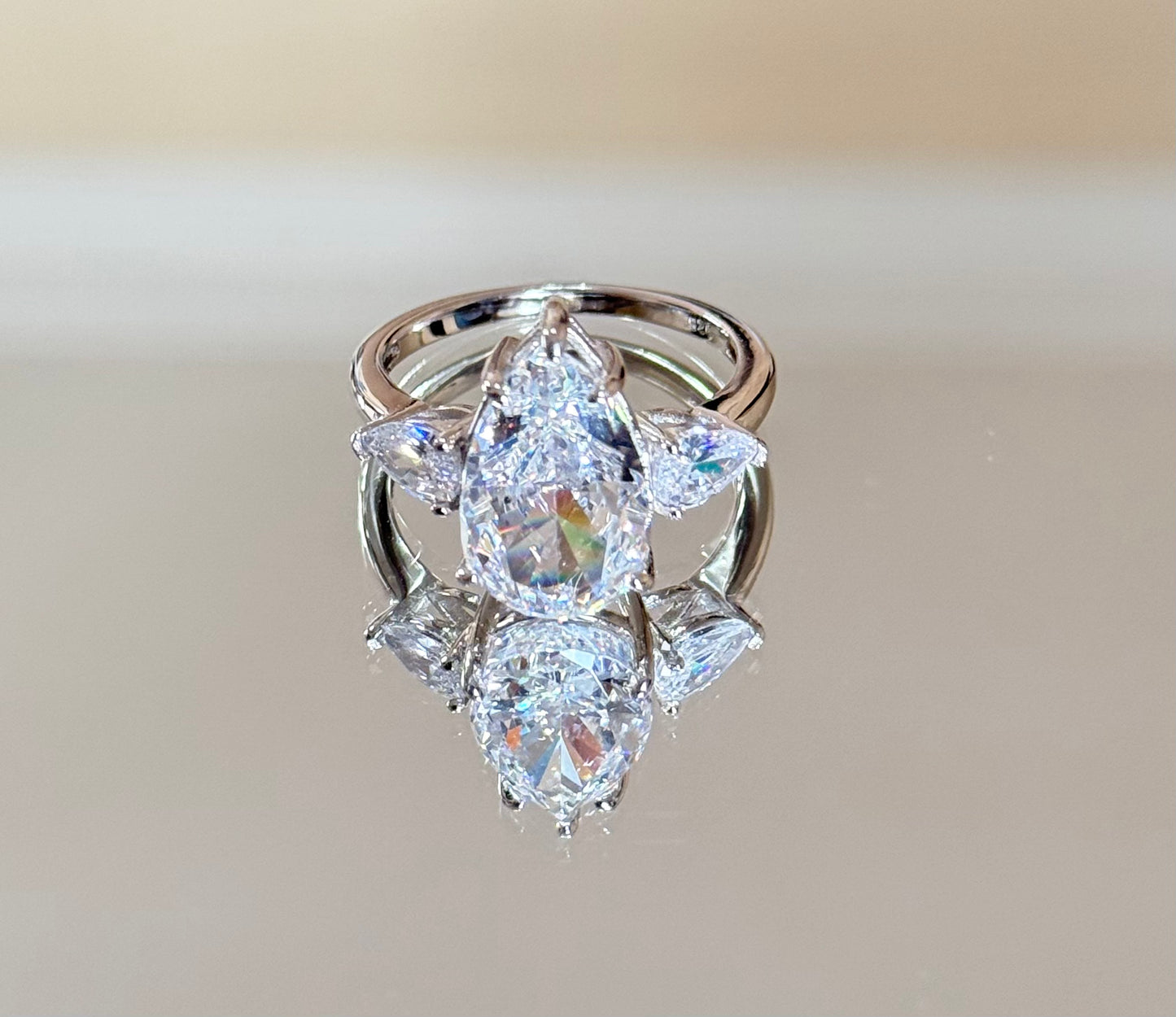 The Sistora 'Stellar Tear' D-Color Three-Stone Pear Ring (925 Silver)