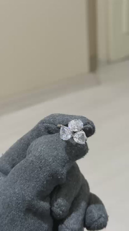 The Sistora Three-Stone Pear Ring